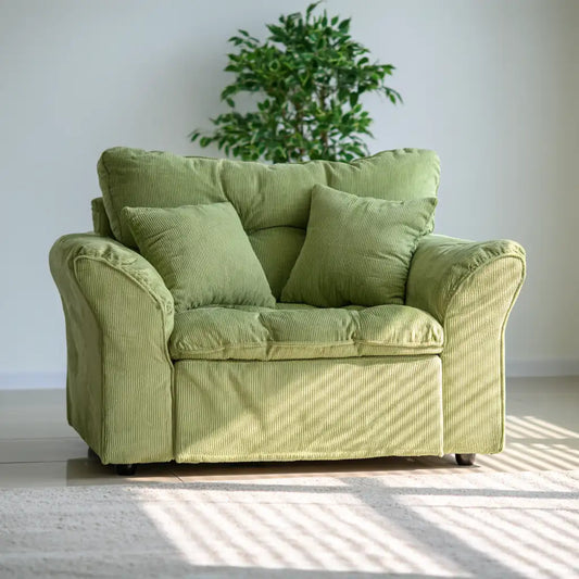 Divano dal profilo contemporaneo, verde, per la casa